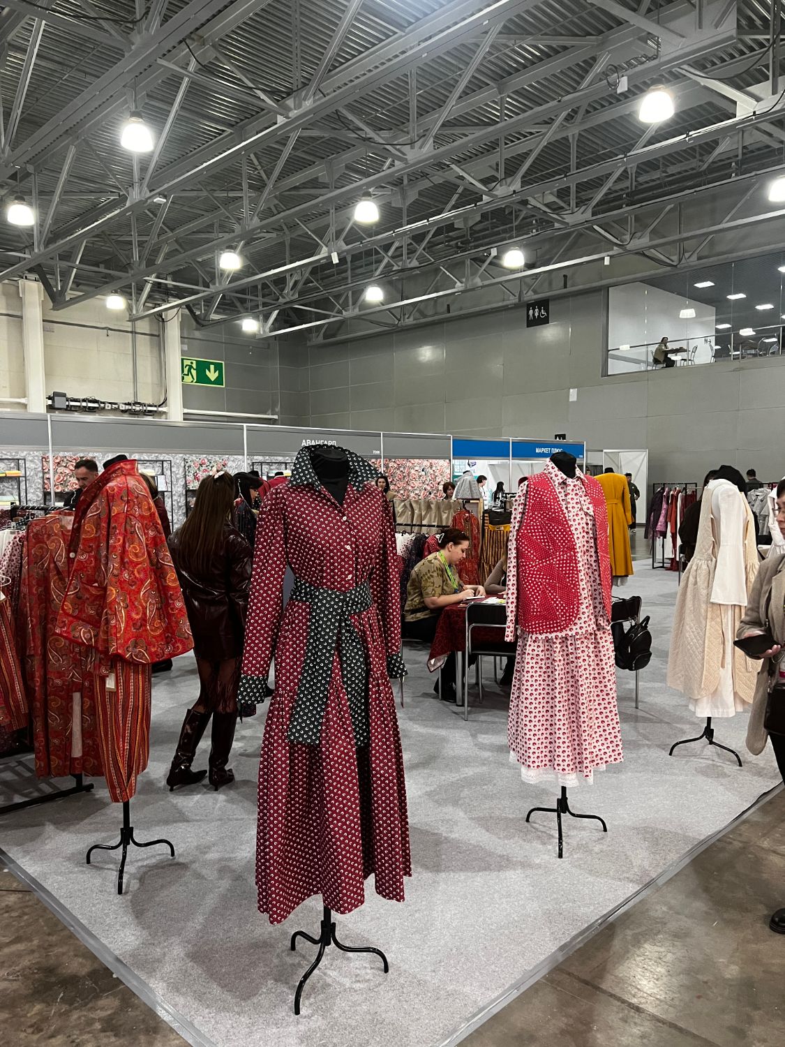 Printed garments displayed on mannequins at Interfabric Moscow.