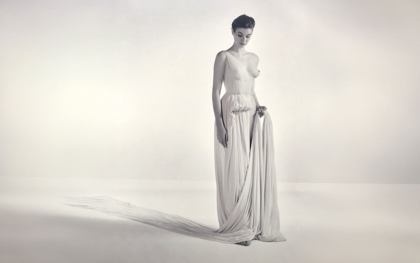 Madame Grès fitting a garment, photographed in 1954 by Willy Maywald.