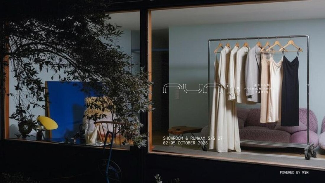The RUN x ANDAM showroom rack in the window, S/S 27, Jardin des Tuileries.